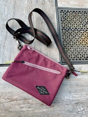 Sherpani Plum Crossbody with Striped Black and Brown Strap & RFID Protection